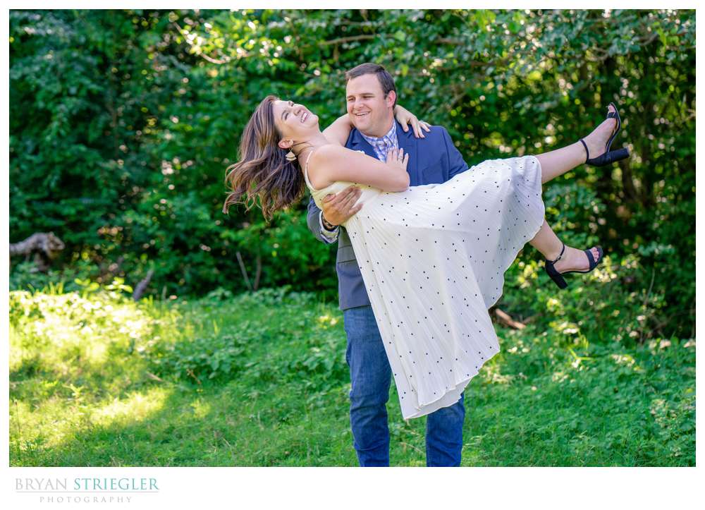 engagement photo with girl picked up