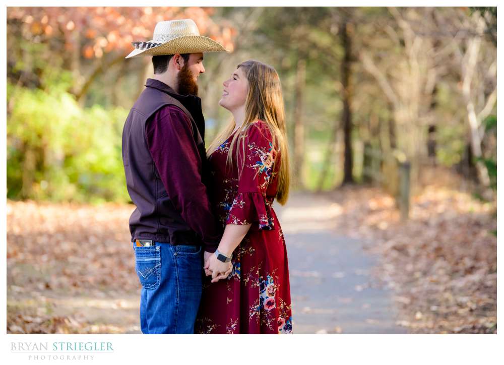 engagement photos on a trail