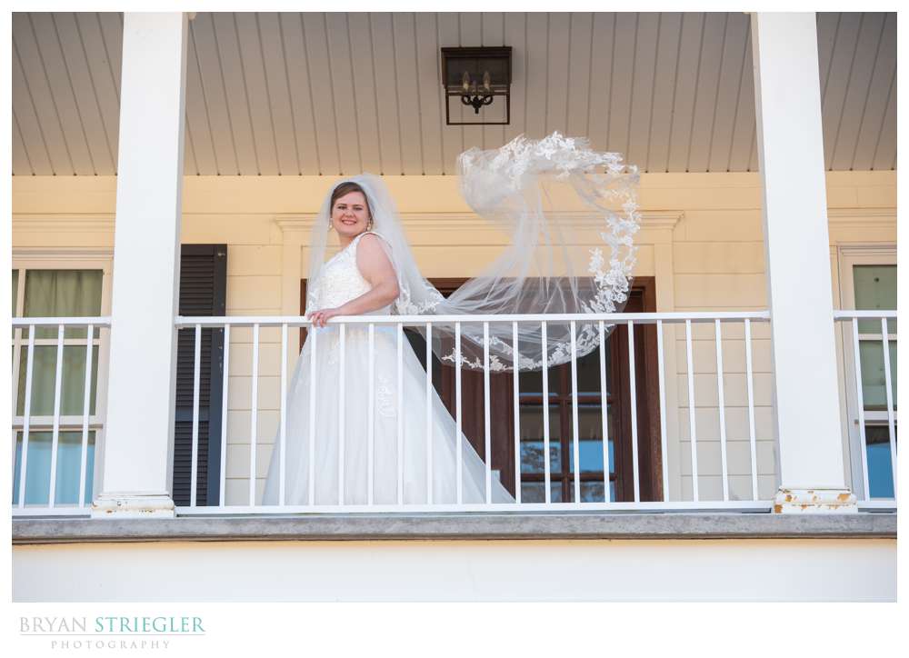 bride with tossed veil