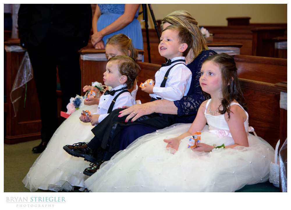 ringer bearer and flower girls at a wedding