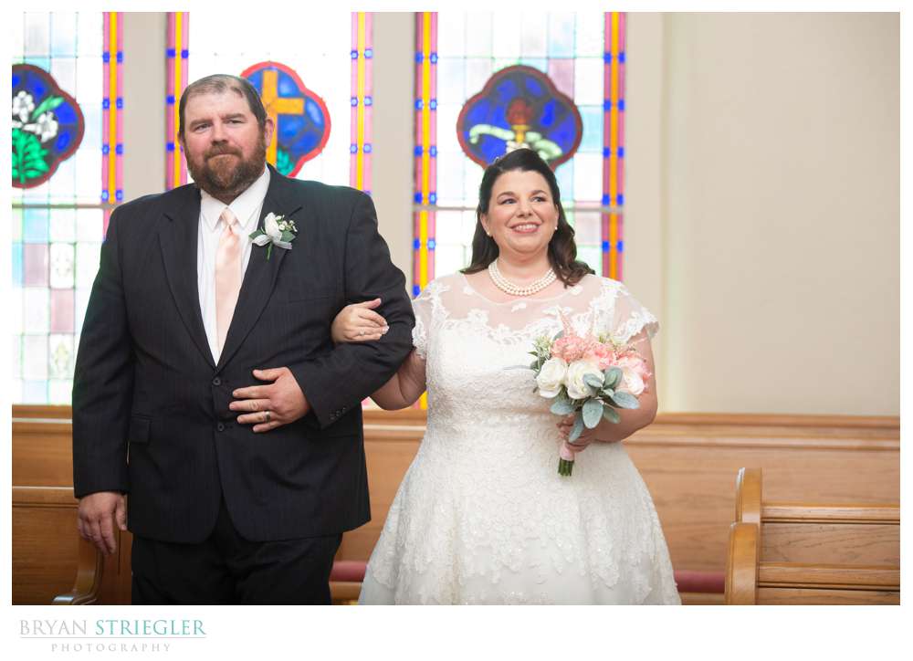 bride walking down with brother