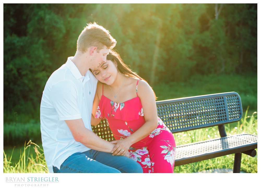 couple sitting on bench