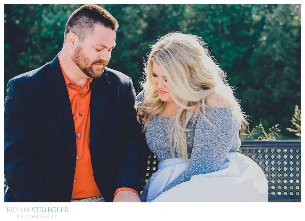 engagement photo on a bench