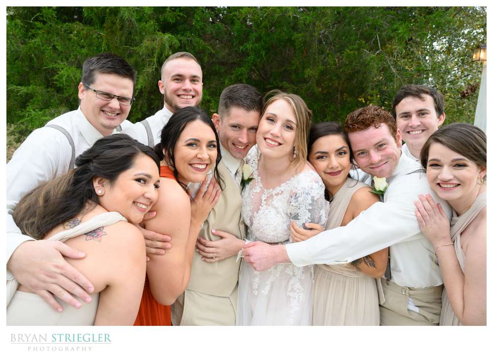 wedding party hugging