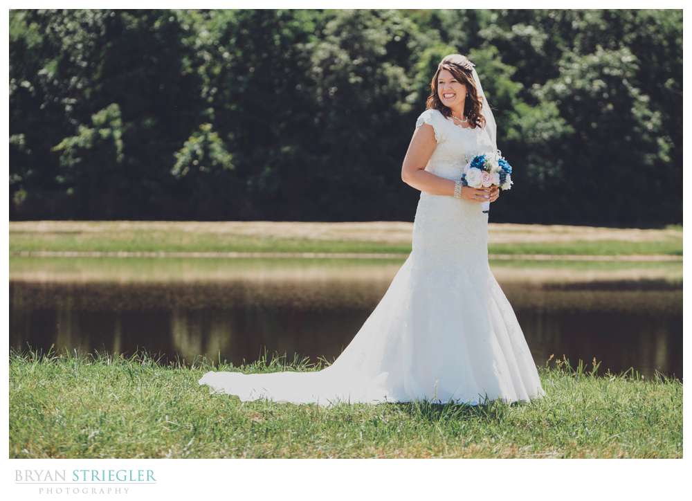 bridal portrait by pond in Van Buren