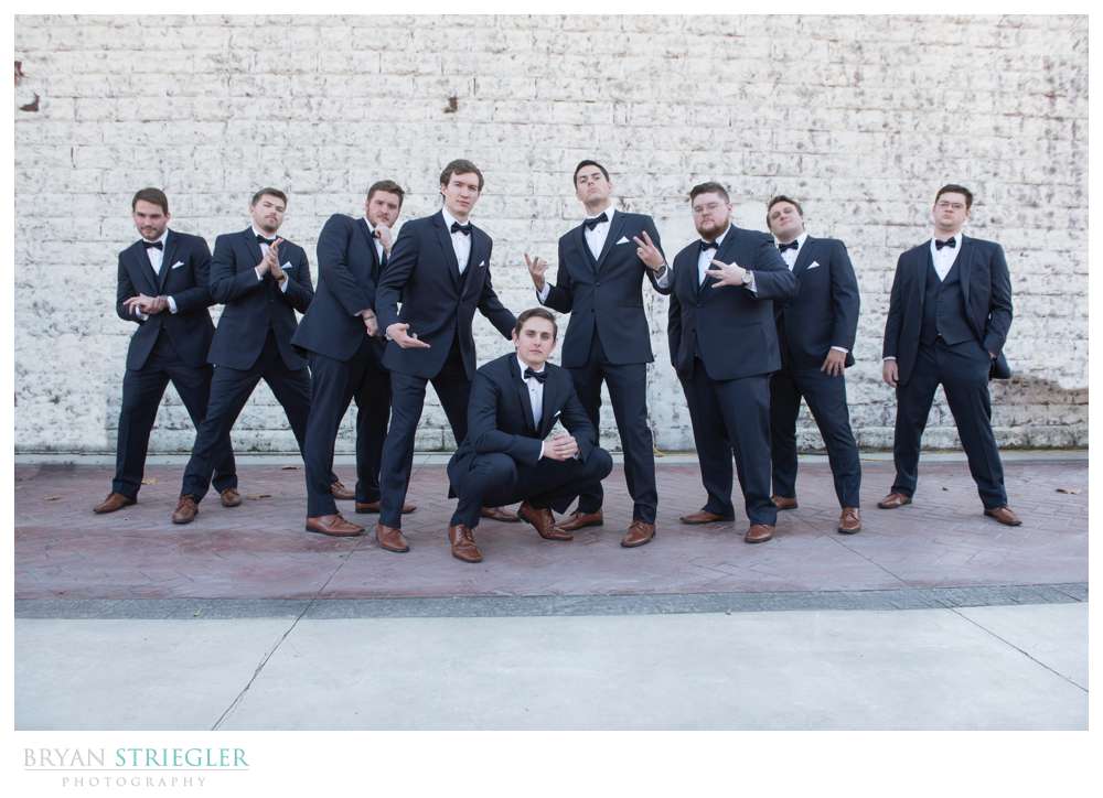 groomsmen striking a pose