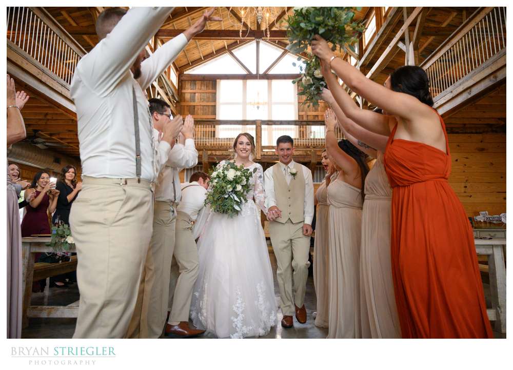wedding entrance through crowd