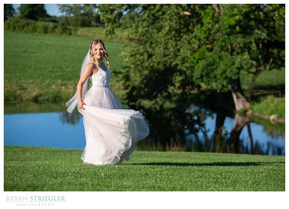 bride spinning in field at Willow Brooke Farm