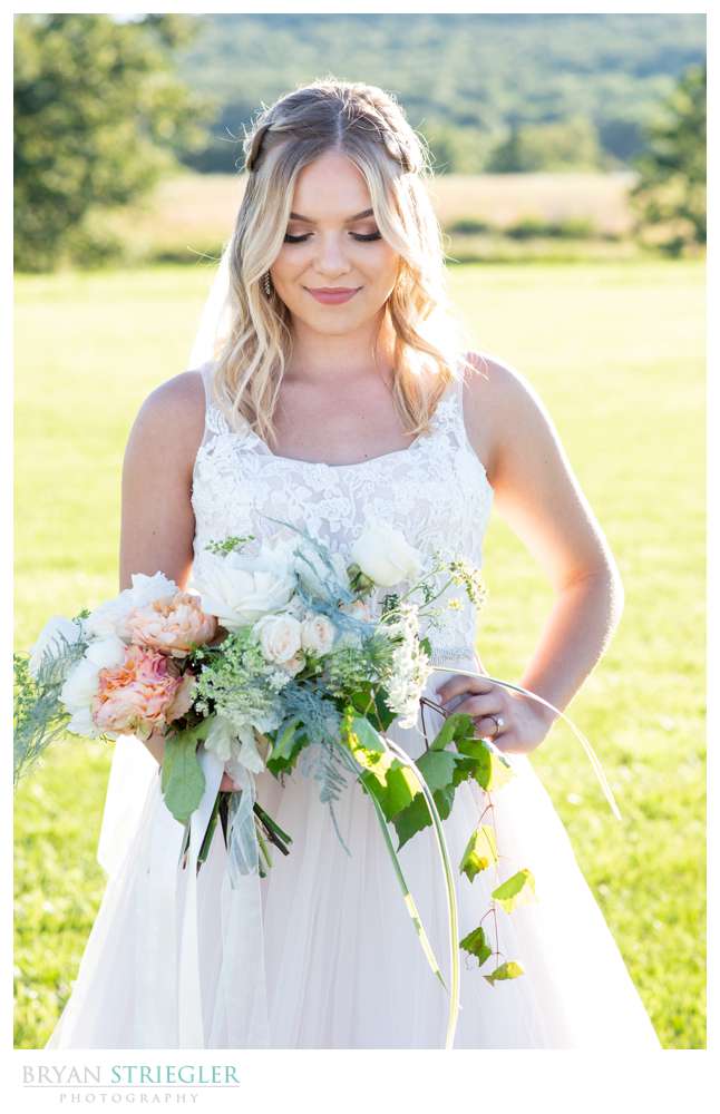 bride holding bouquet from Rose of Sharon