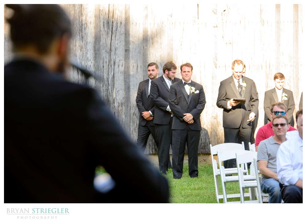 brother of the groom playing a song