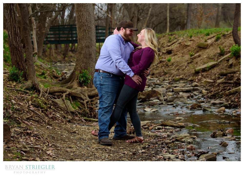 engagement photos in creek at Wilson Park
