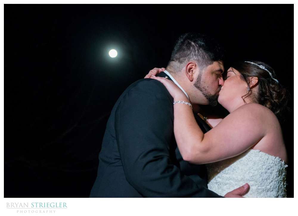 kissing under a full moon