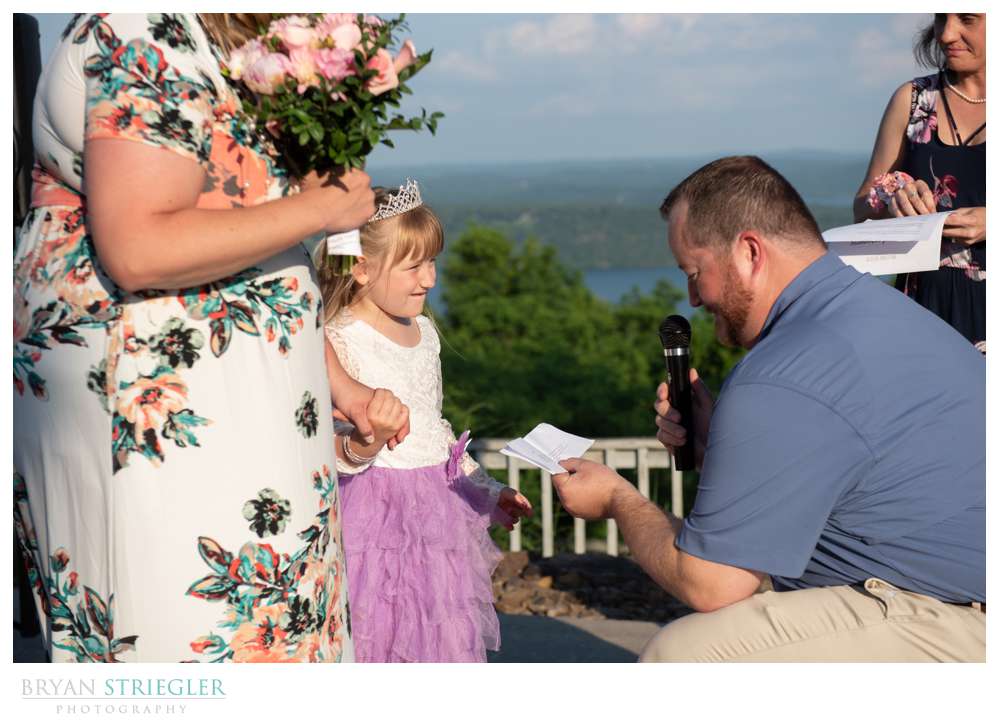 groom giving daughter special gift