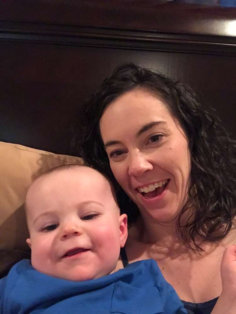 Mother laughing with baby