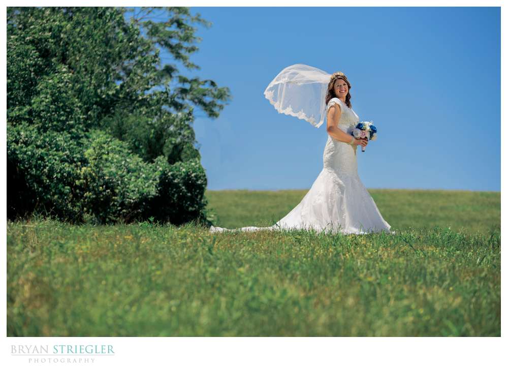 bride on hill with vail
