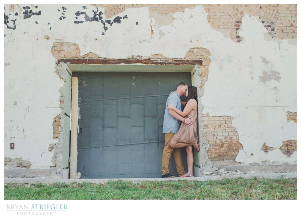 engagement photo in run down building