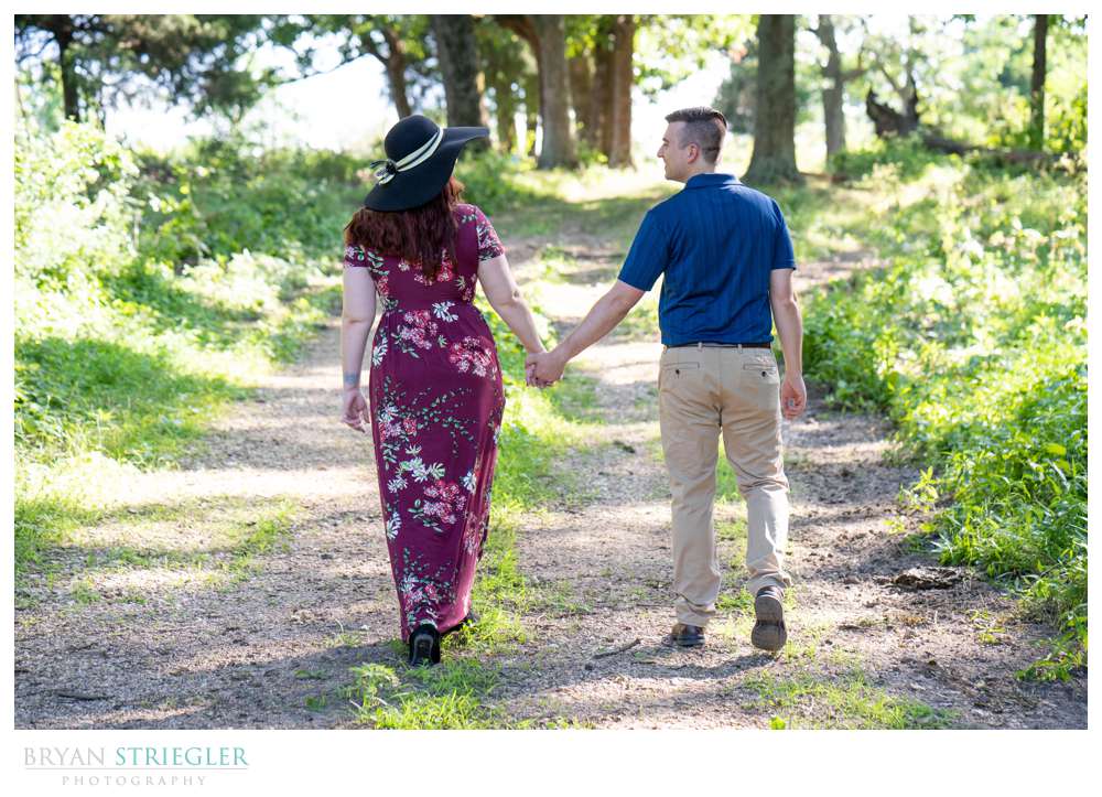 engagement session walking in woods