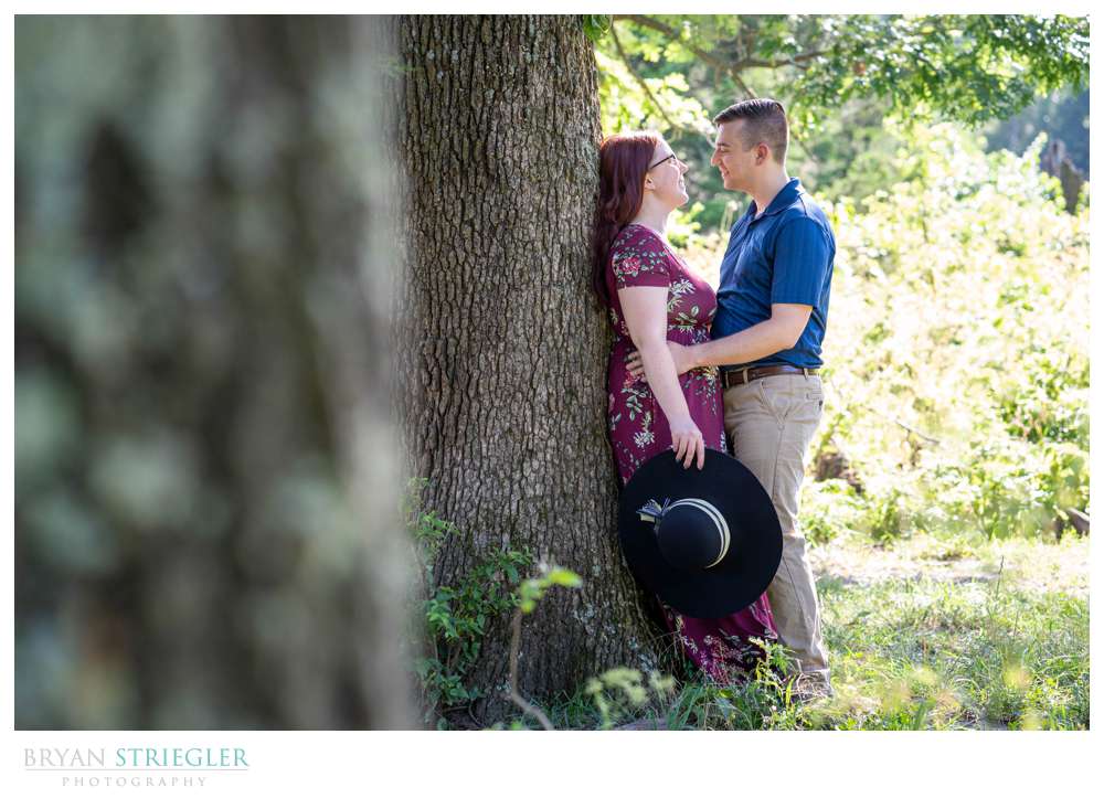 engagement photos against tree
