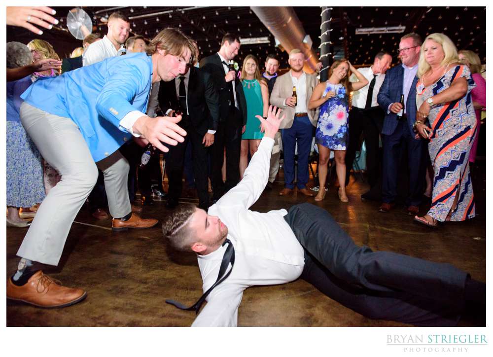 crazy wedding dancing on the floor