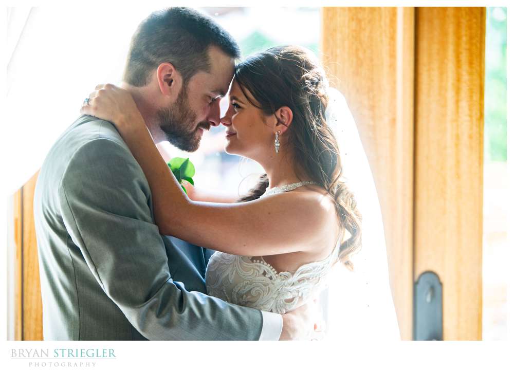 wedding couple in front of doors