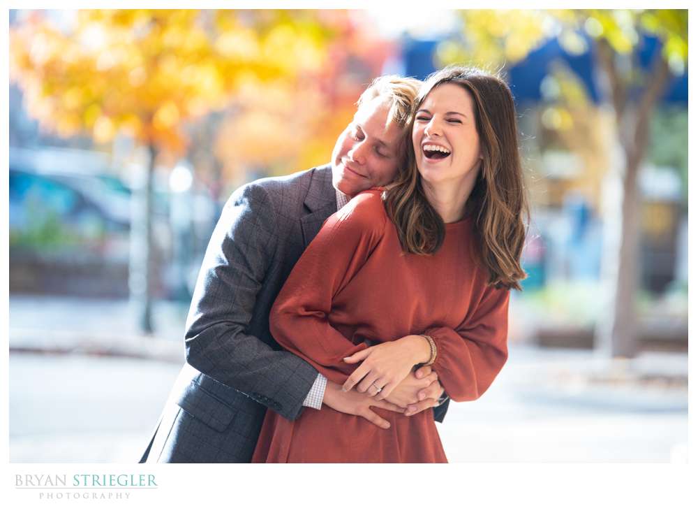 hugging and laughing photo
