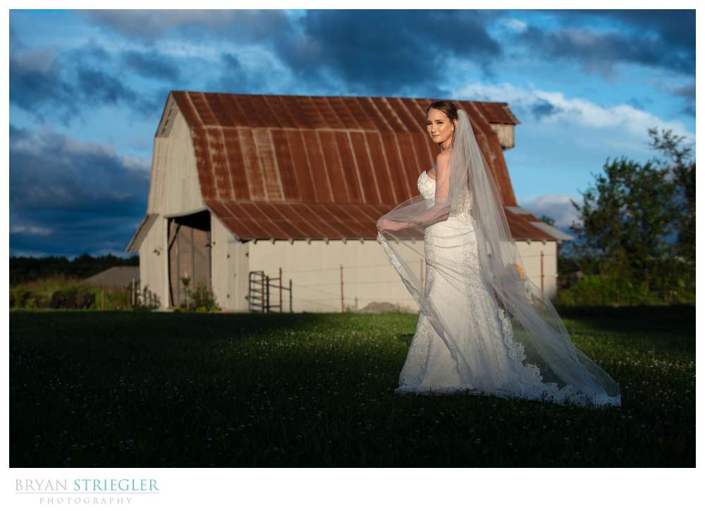 bride with barn