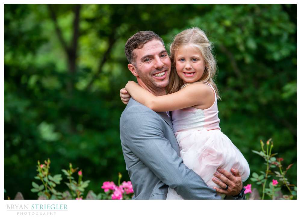 holding daughter