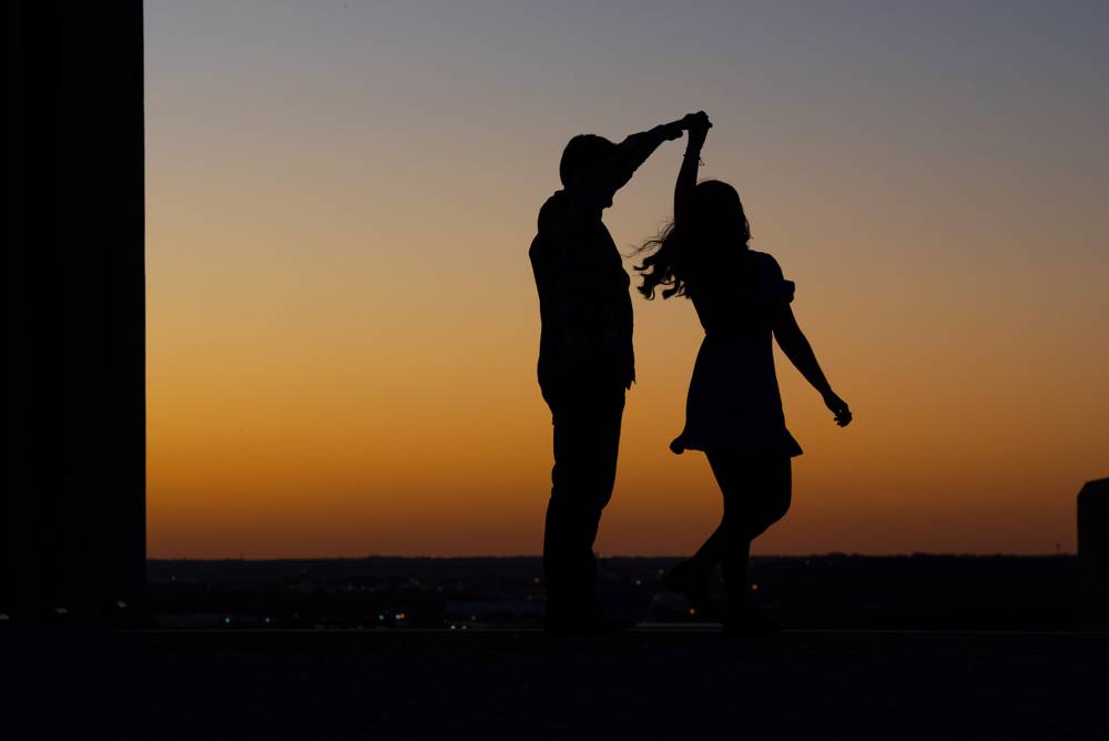 dancing silhouette engagement photo