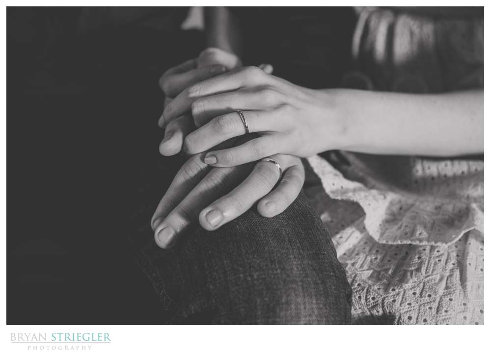 close up of bride and groom's hands