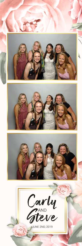 bride with girls in photo booth