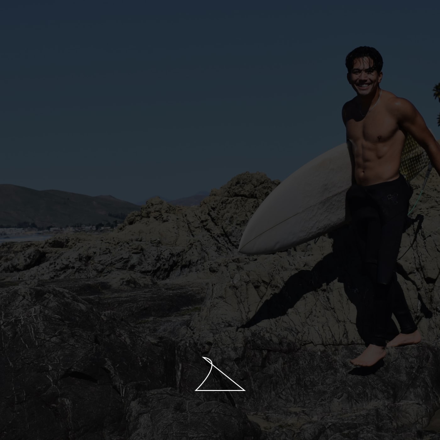 Surfer moving through the face of a wave