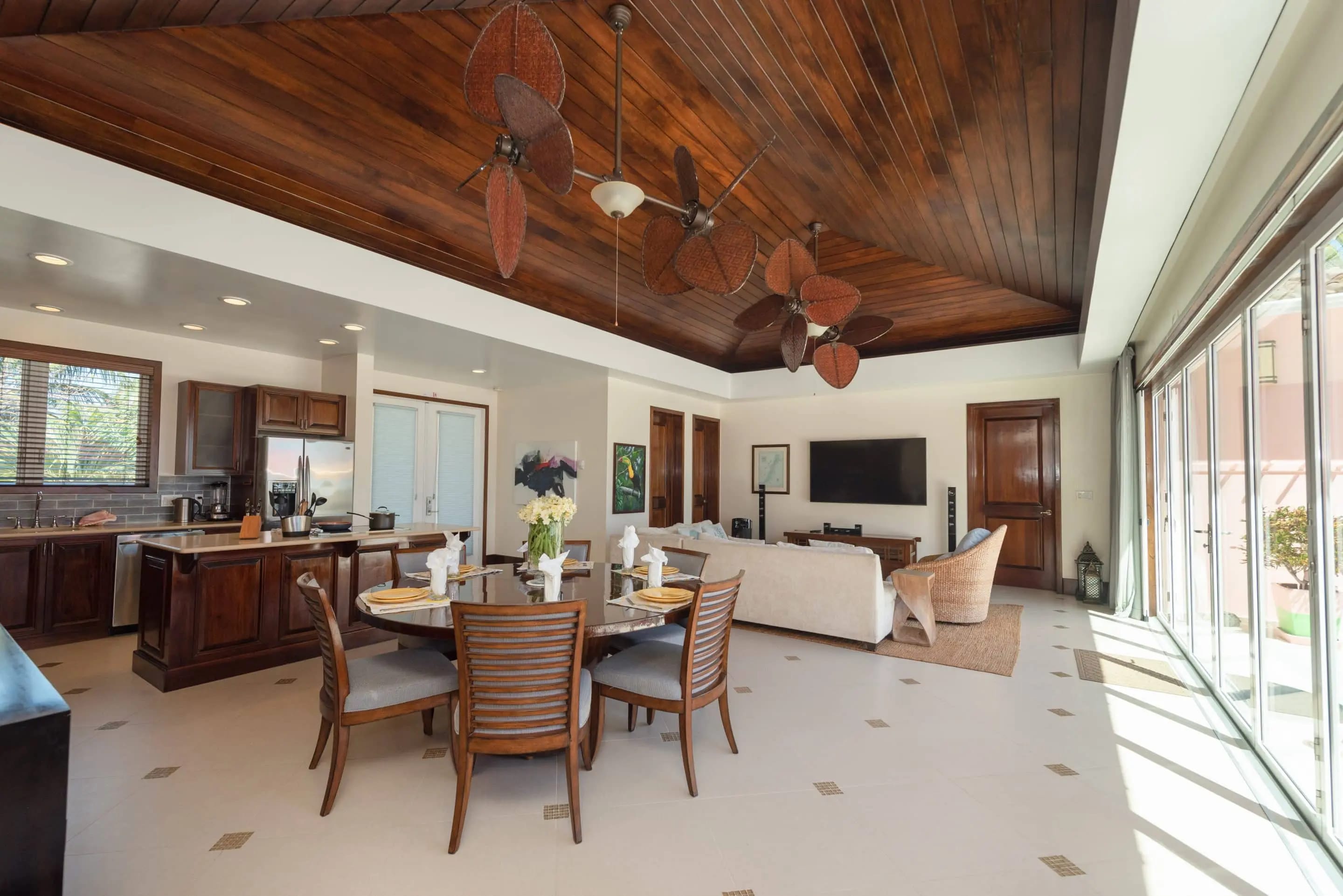 Wide view of the great room with kitchen and dining area