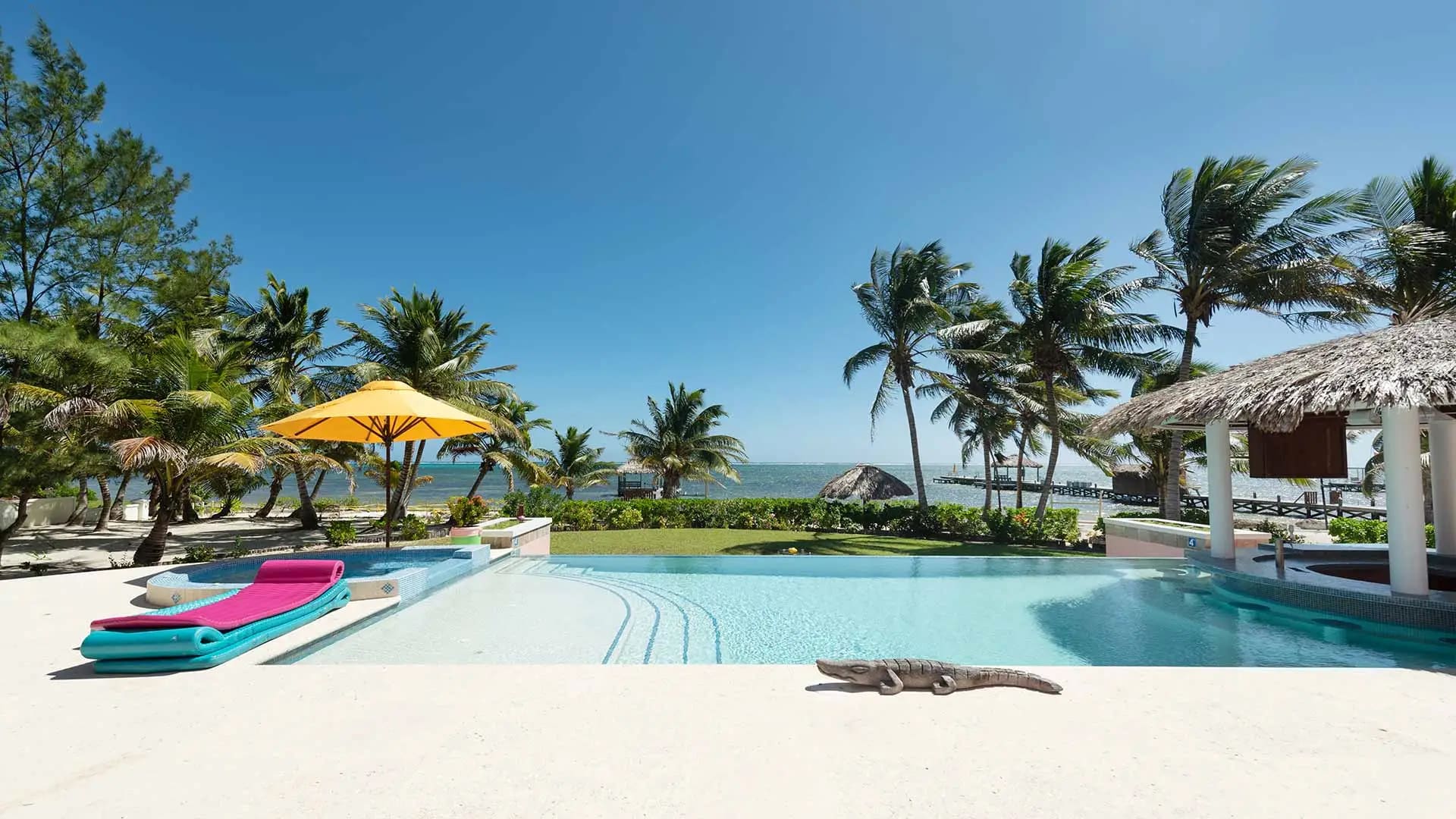 Villa pool and deck overlooking the water