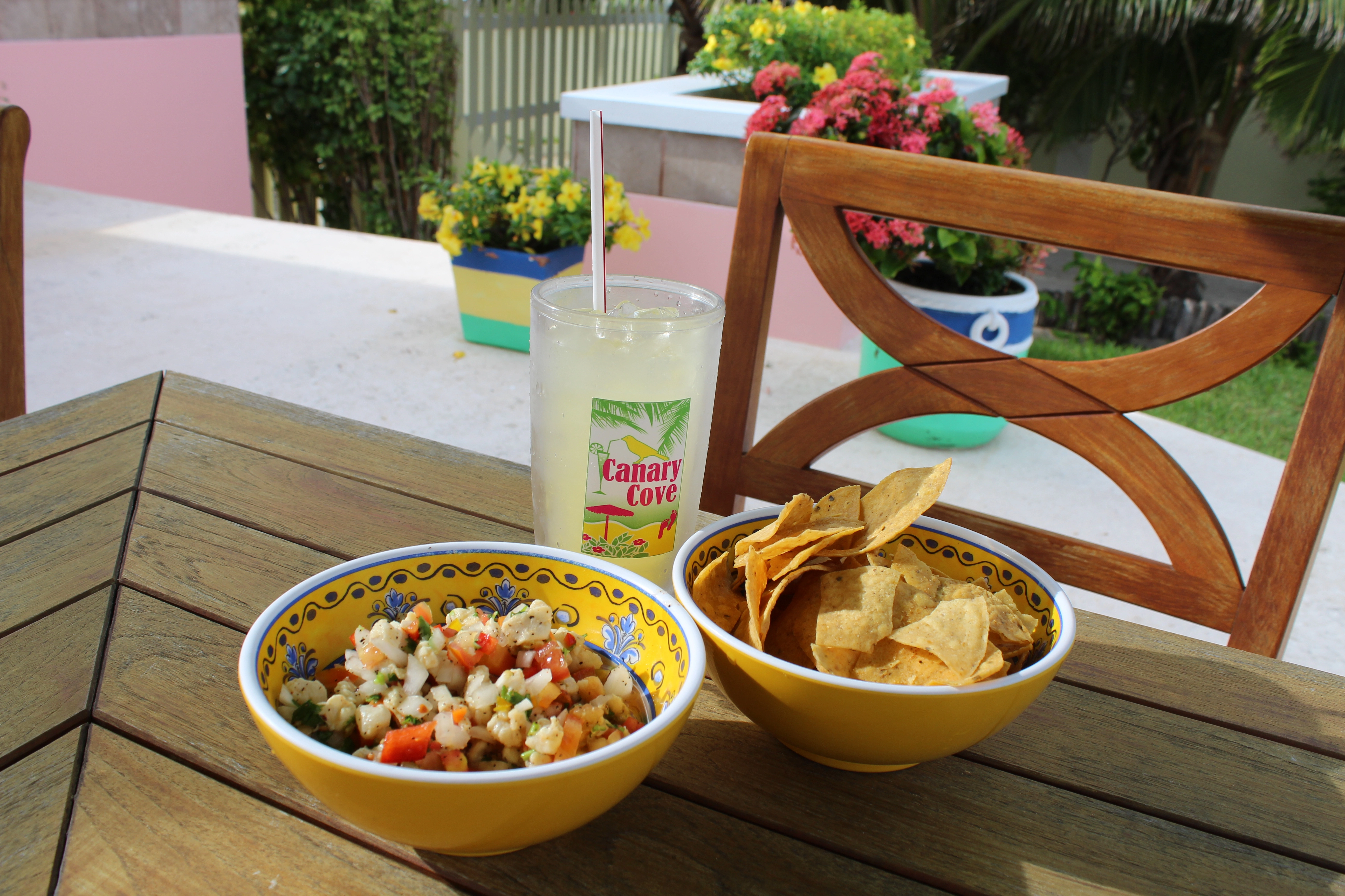 Chips and drinks served with Canary Cove branding