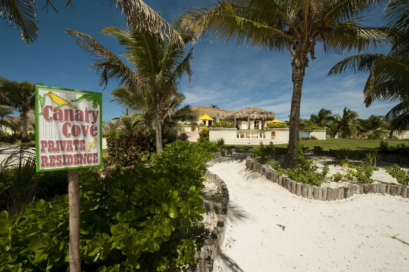 Canary Cove sign along beach path entry