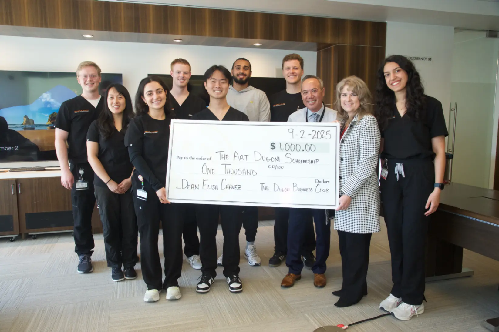 Michael Njo, DDS at the Dugoni Business Club donation ceremony