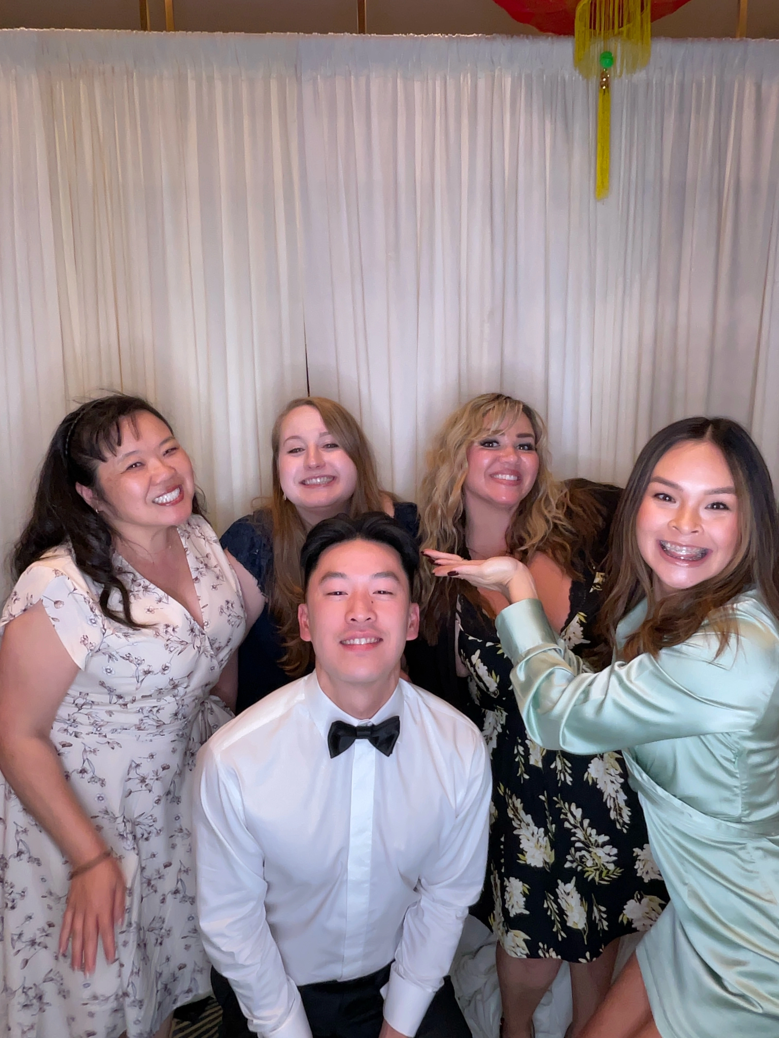 Dr. Wong and Dr. Michelle celebrating with the team