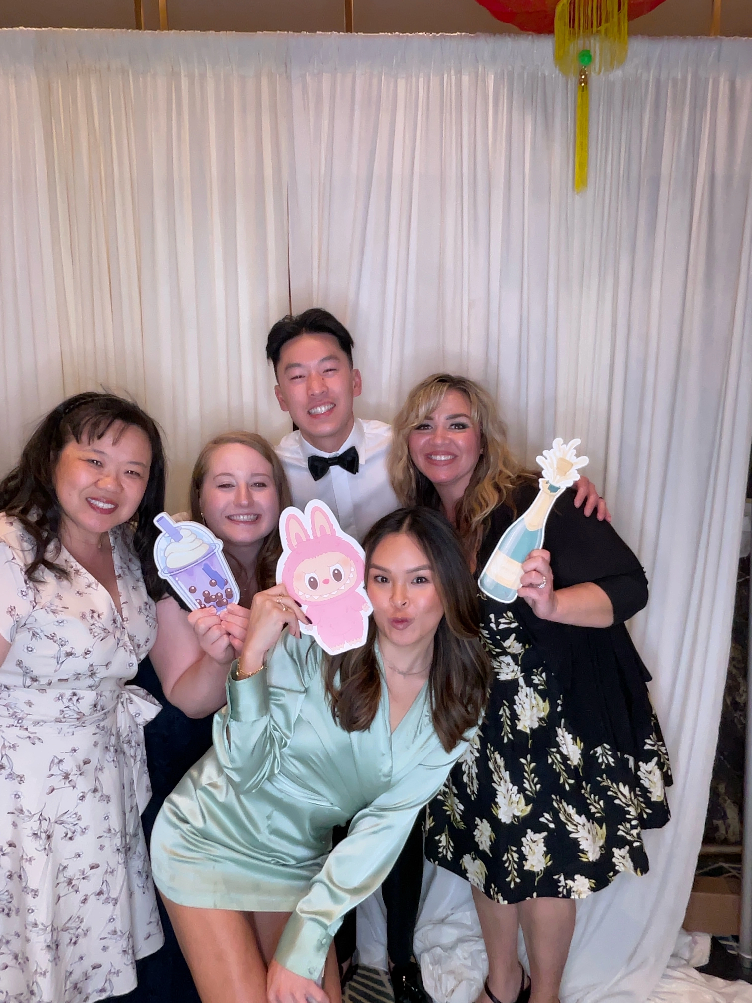 Wedding party cheering together