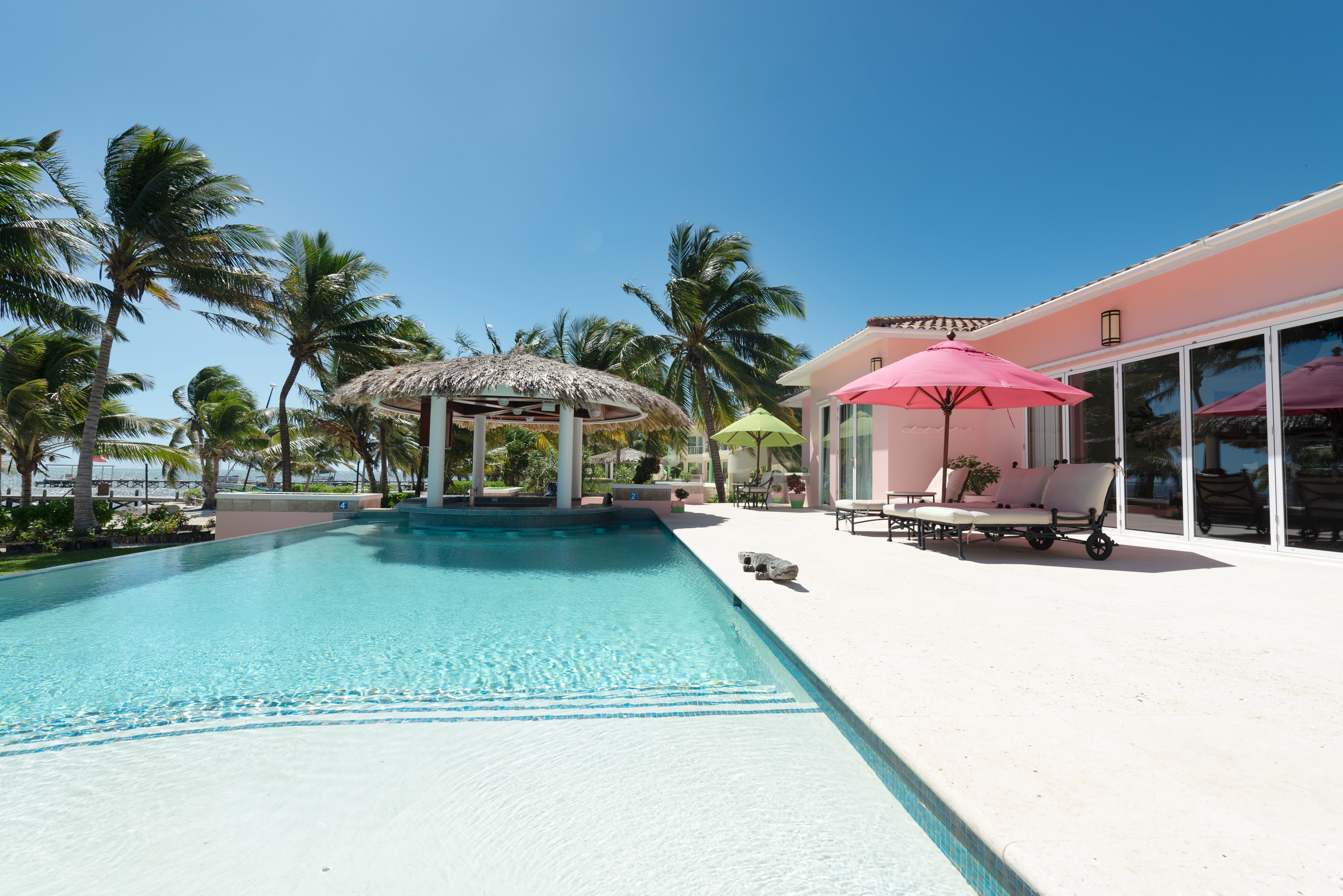 Pool terrace beside the villa exterior