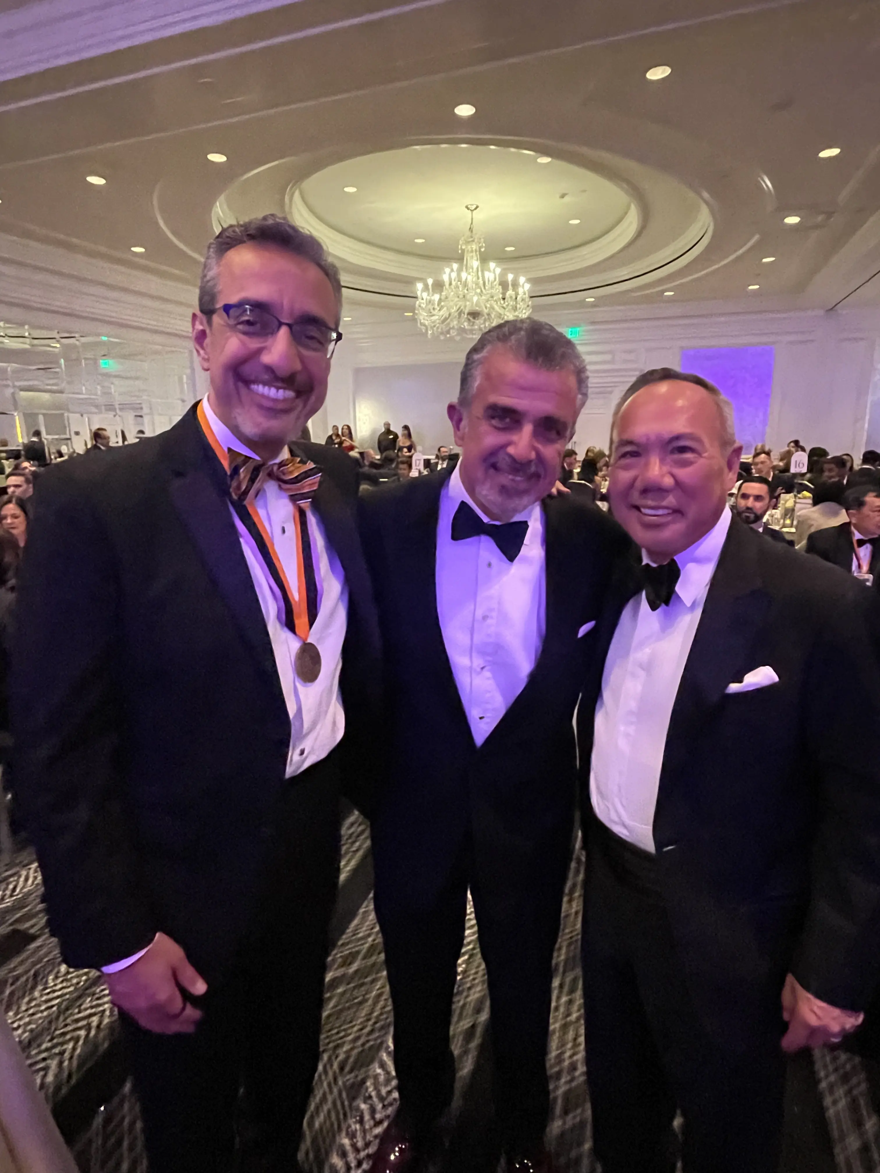 Dr. Njo with attendees at a professional gathering.