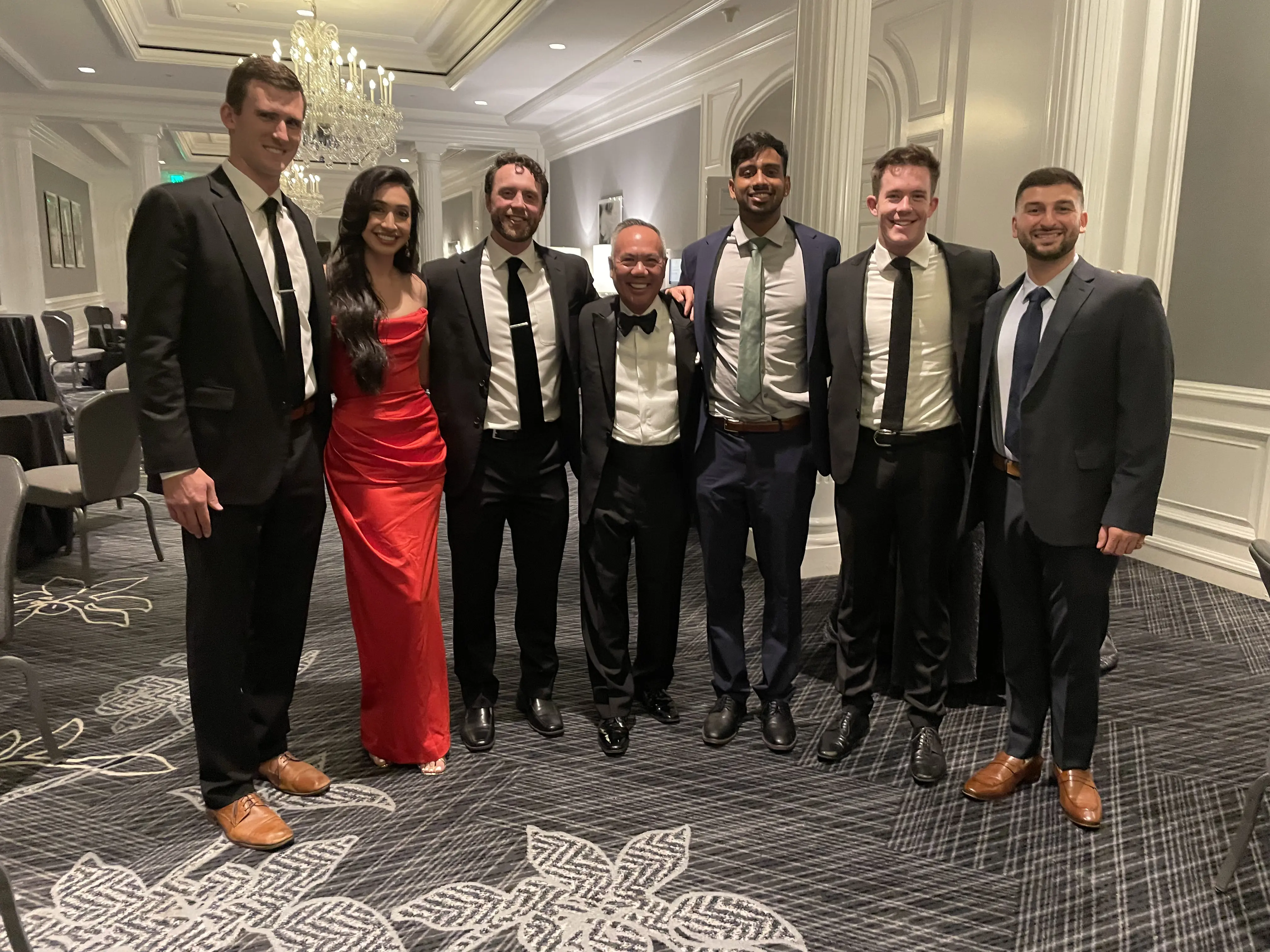 Dr. Njo with colleagues during a group session.