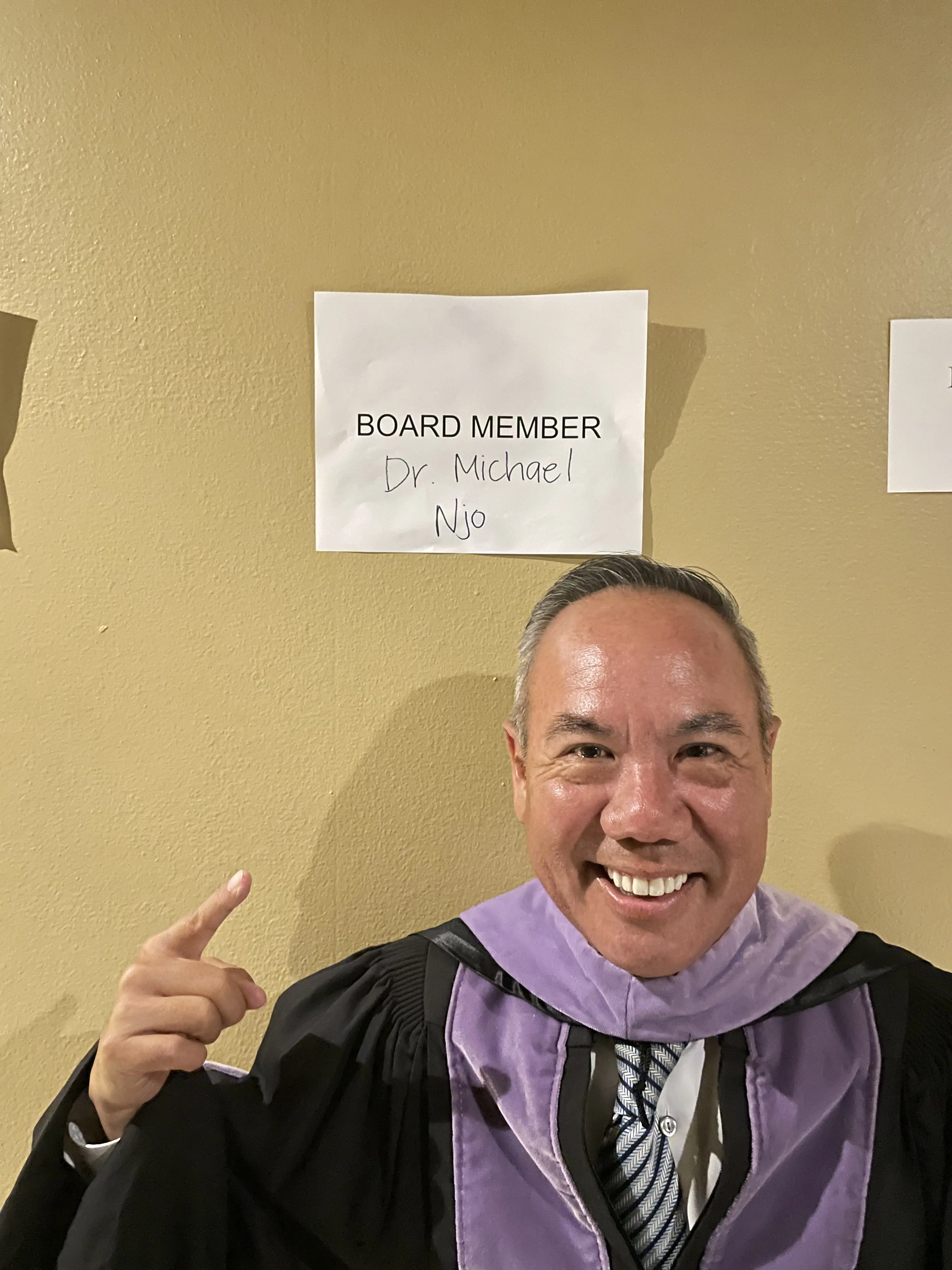 Dr. Njo with colleagues at a group celebration.