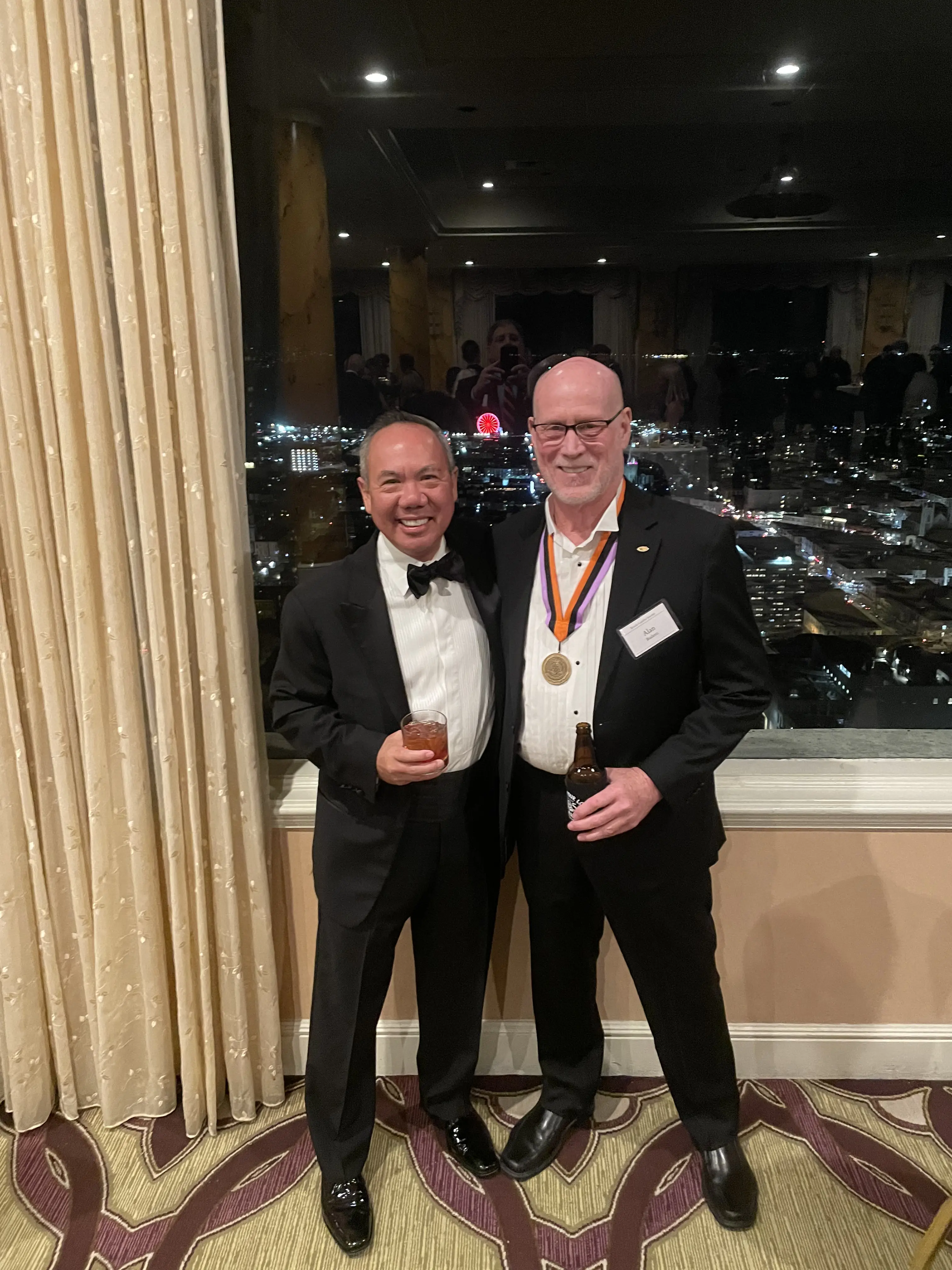 Dr. Njo with partners celebrating a milestone.