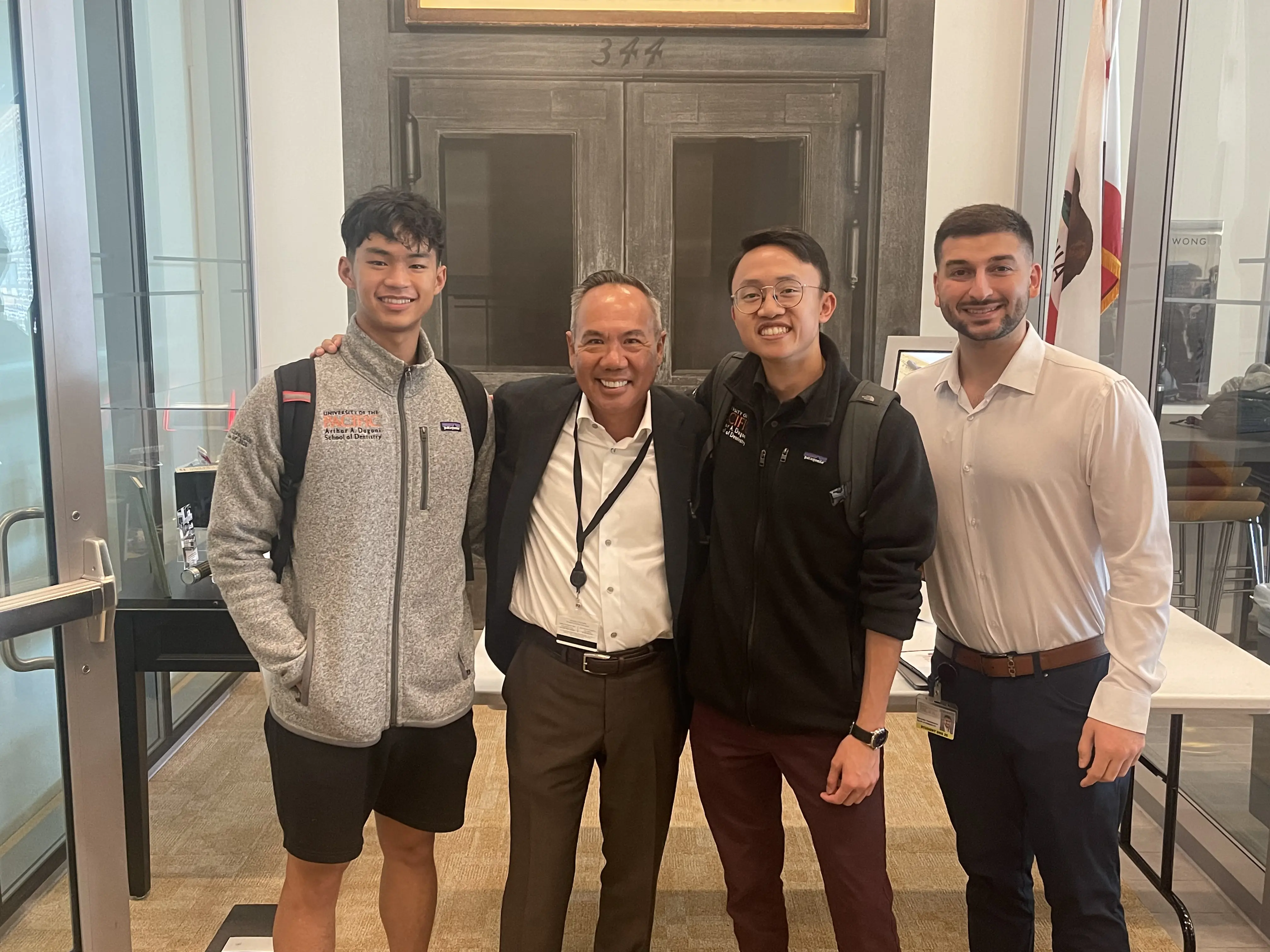 Dr. Njo with colleagues during a community event.