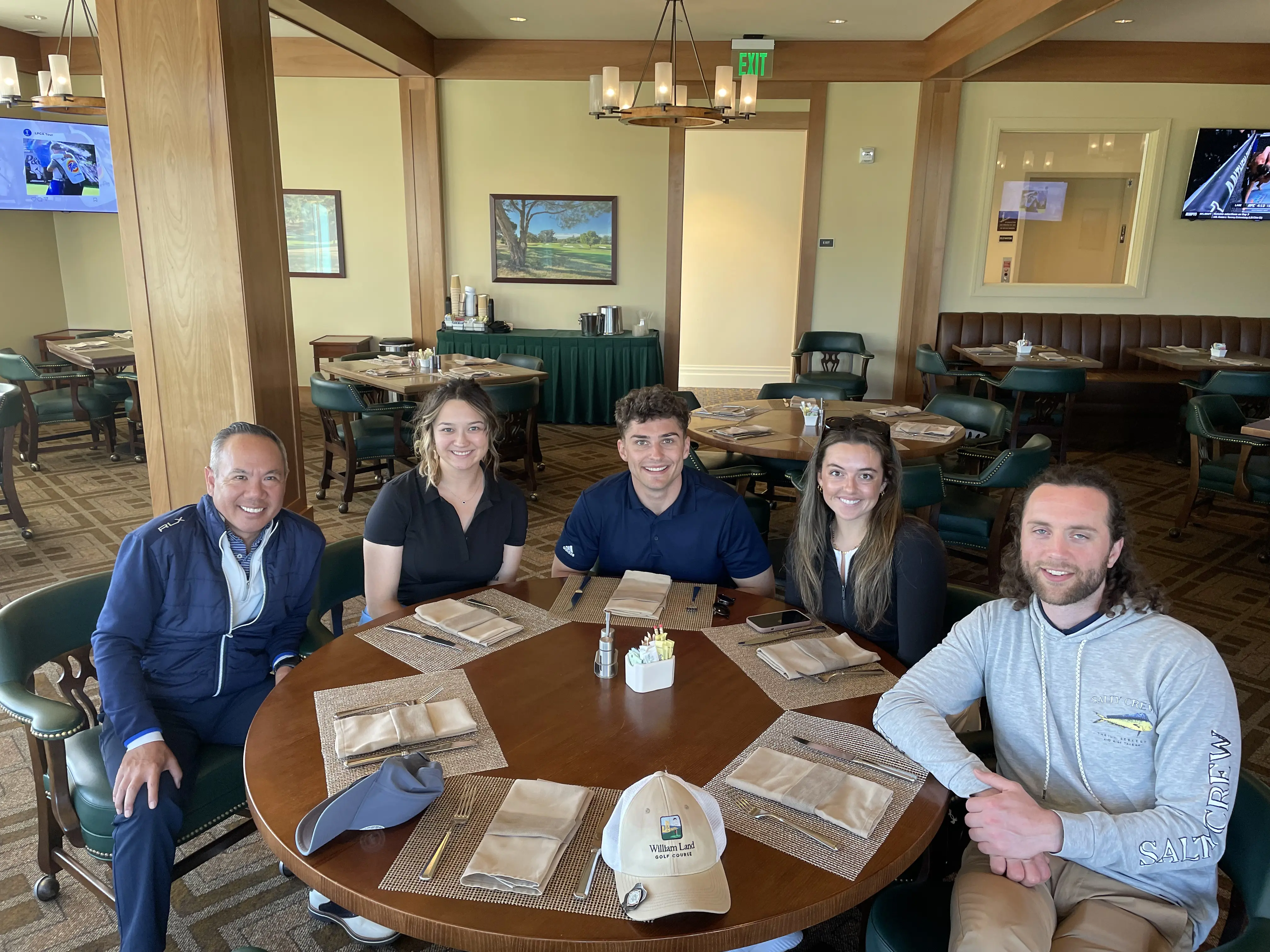 Dr. Njo with colleagues at a professional gathering.