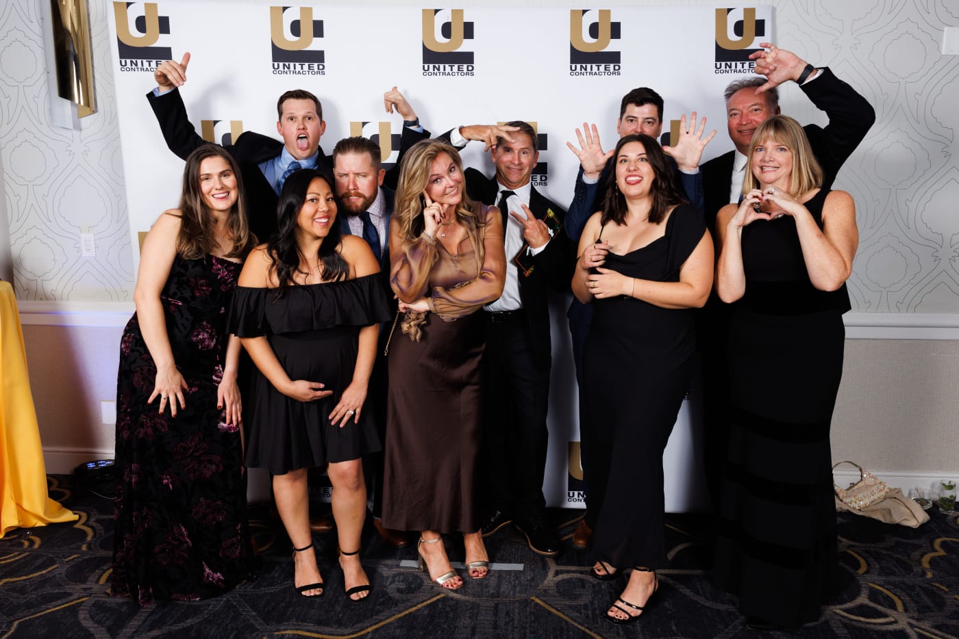 Guests posing at the photo booth during the 2024 Auction