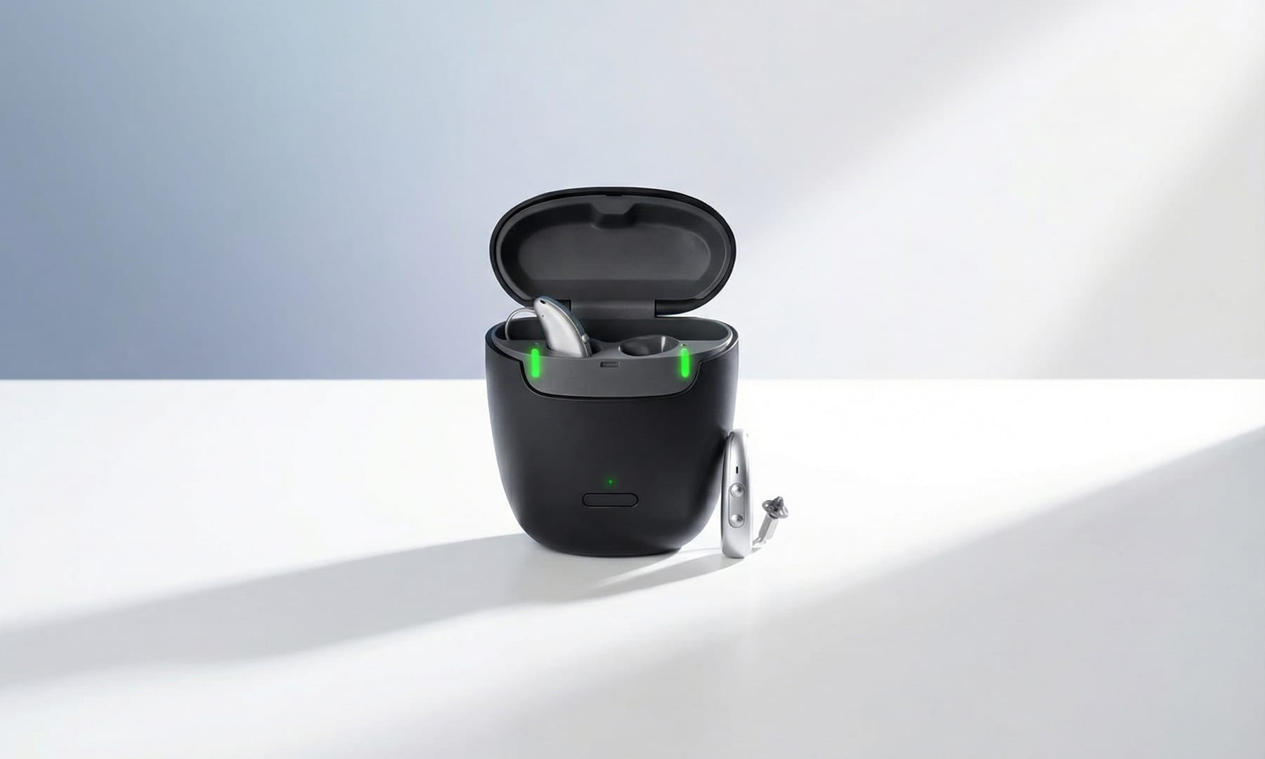 Open hear.com charging case with a pair of Horizon rechargeable hearing aids inside