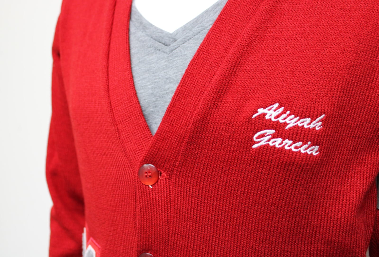 Staff cardigan with custom patches example