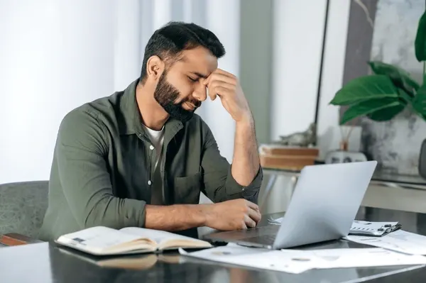 man thinking about mistakes