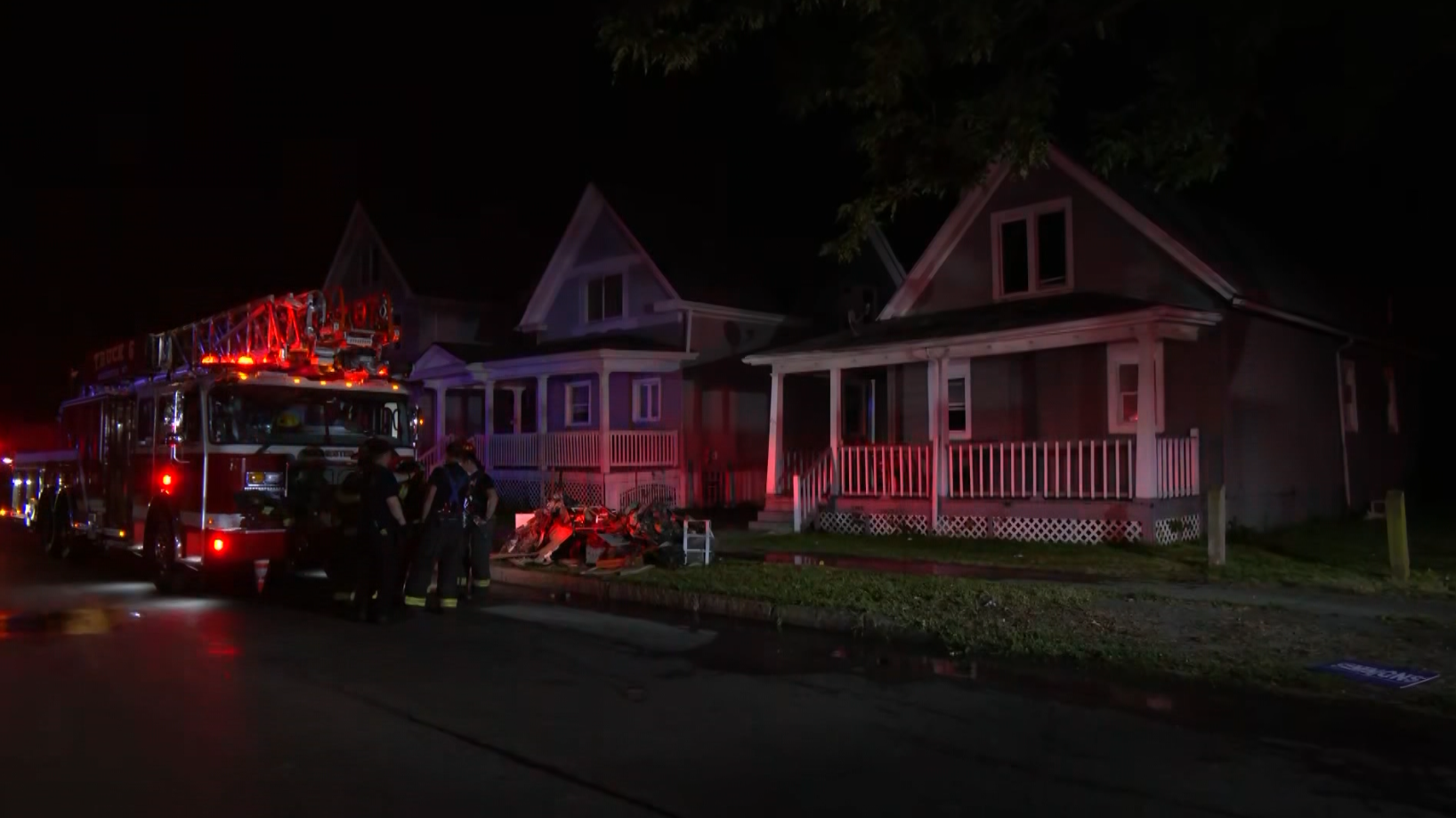 Rochester Firefighters Rescue Person from Roof During House Fire on Avenue D